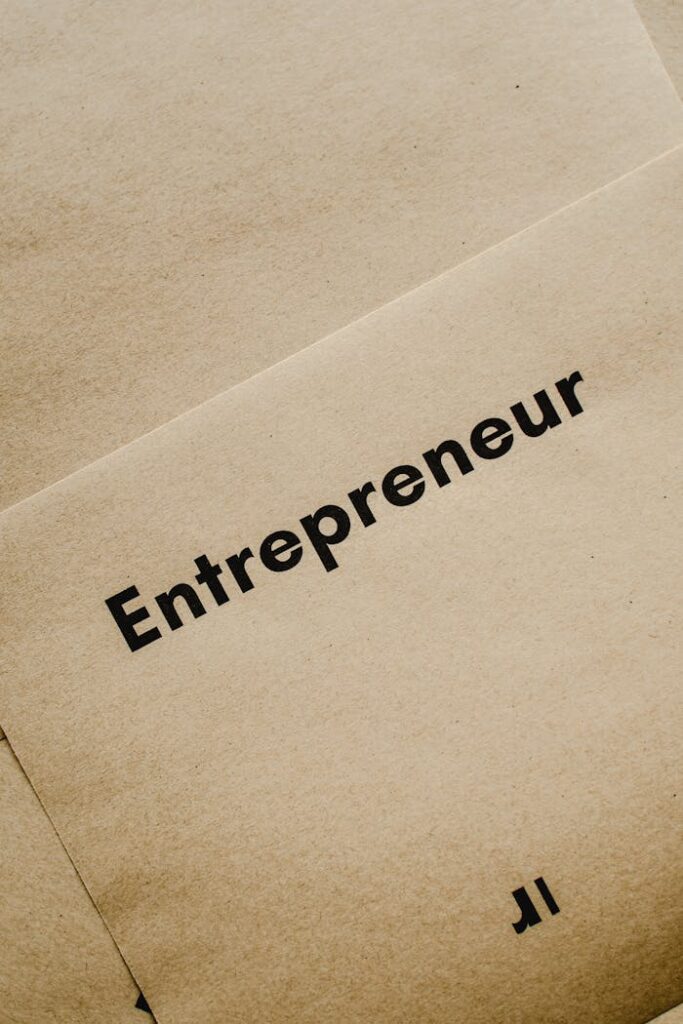 Close-up of the word 'Entrepreneur' printed on brown paper, symbolizing business innovation.